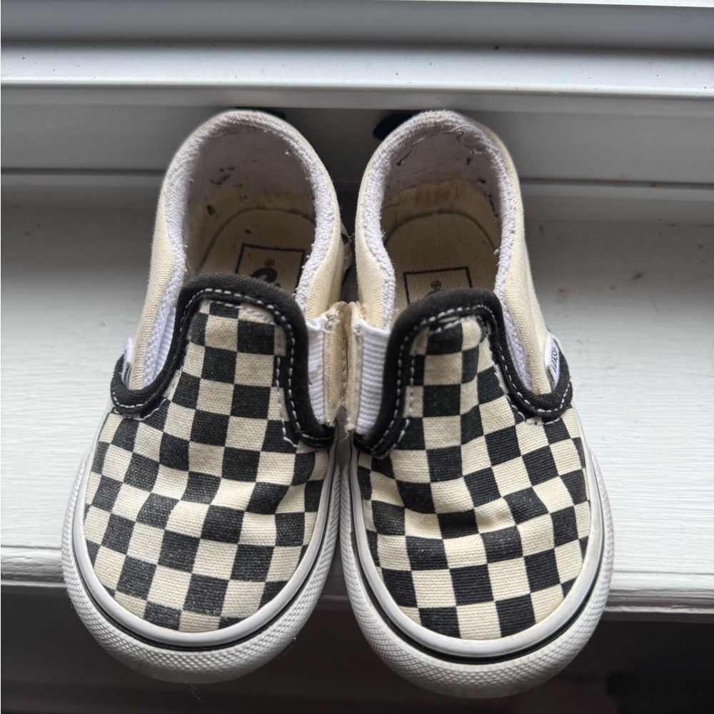 Vans Black and Cream Checkerboard Slip-On Sneakers